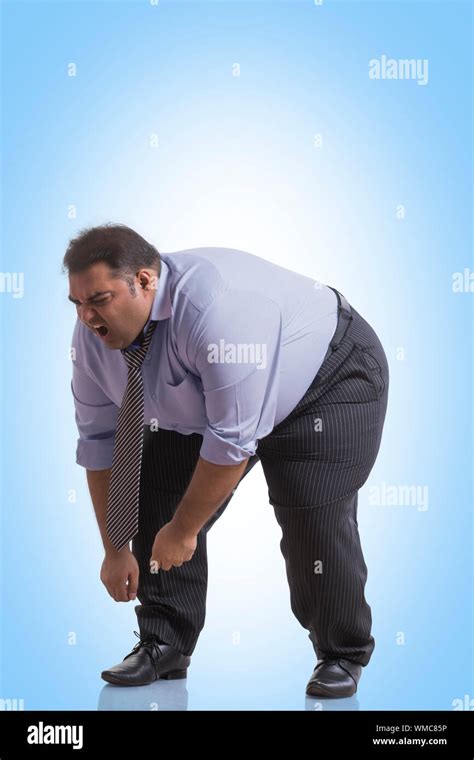 fat guy bending over|Guy bending over